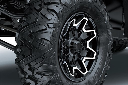 Close-up of a tire of a side x side in a white studio background. opens in a new window