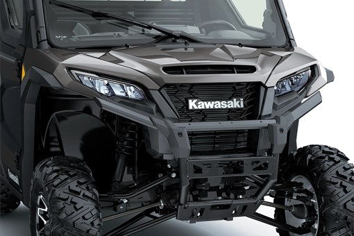 Close-up of the front end of a side x side in a white studio background. opens in a new window