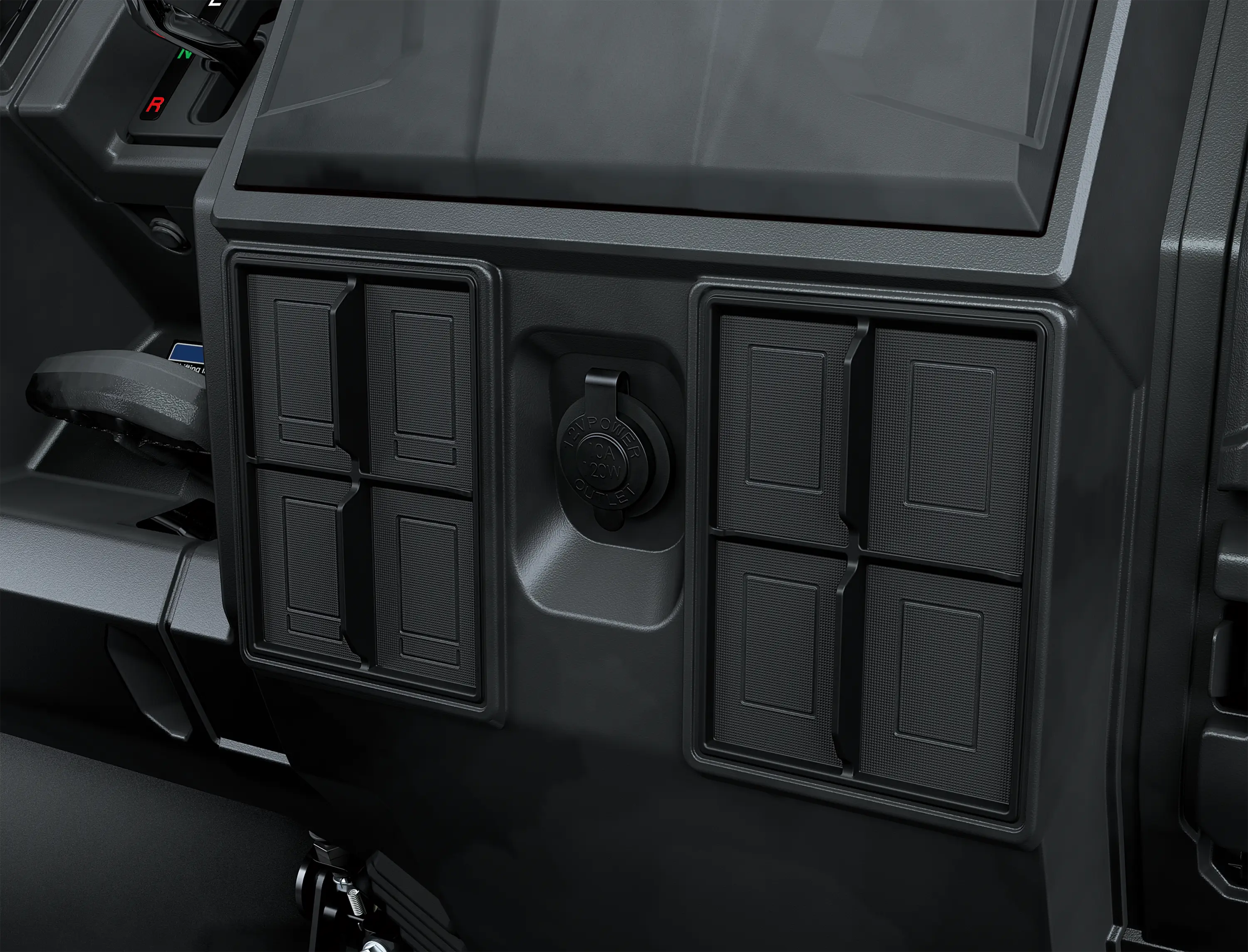 Close-up of a 12V power outlet in a side x side.