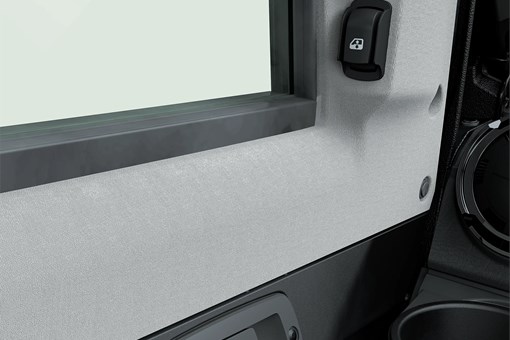 Close-up of the power window buttons in a side x side. opens in a new window