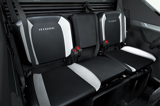Close-up of the bench seating in a side x side. opens in a new window