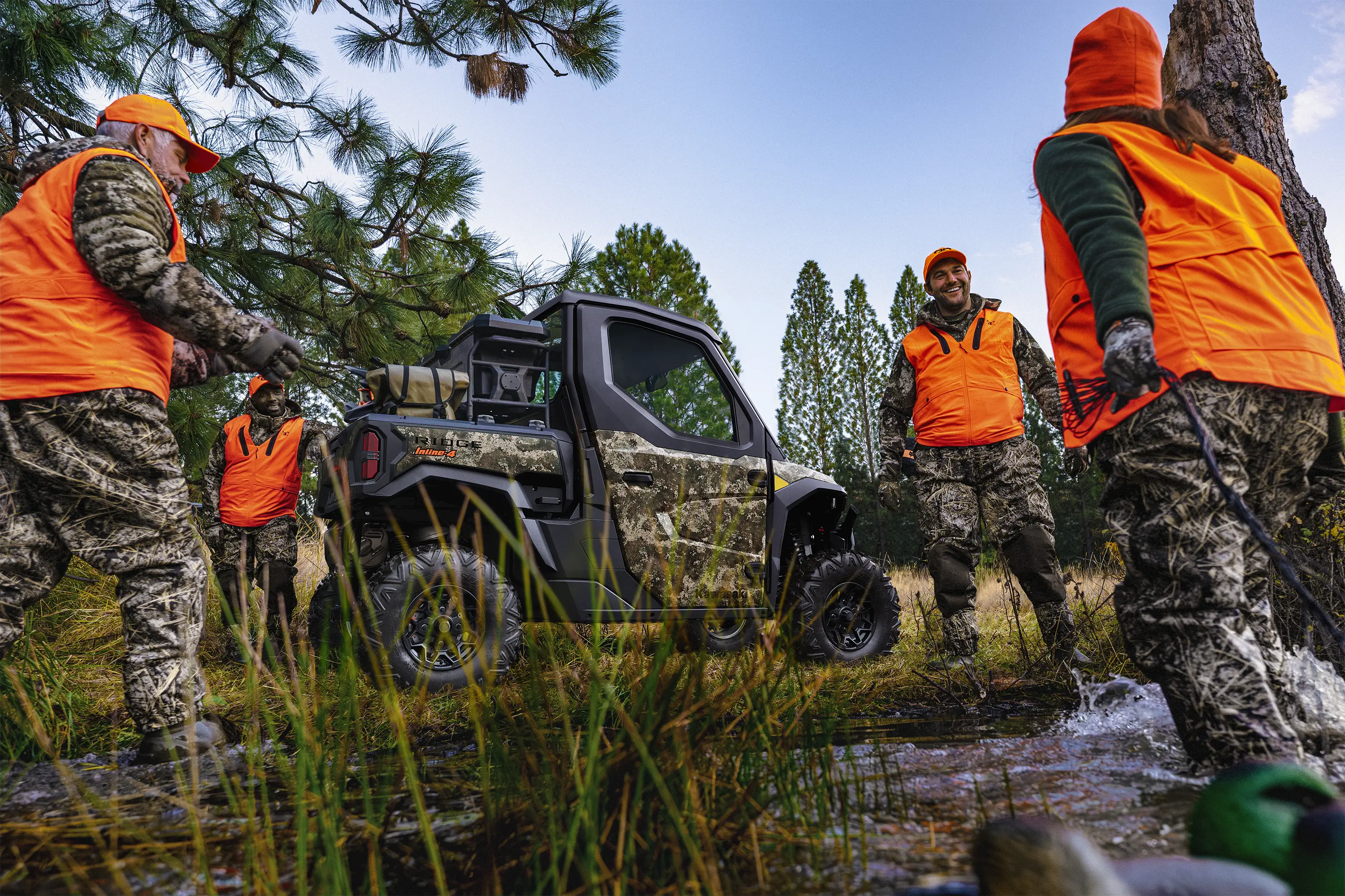 Side angle of a side x side parked off-road.