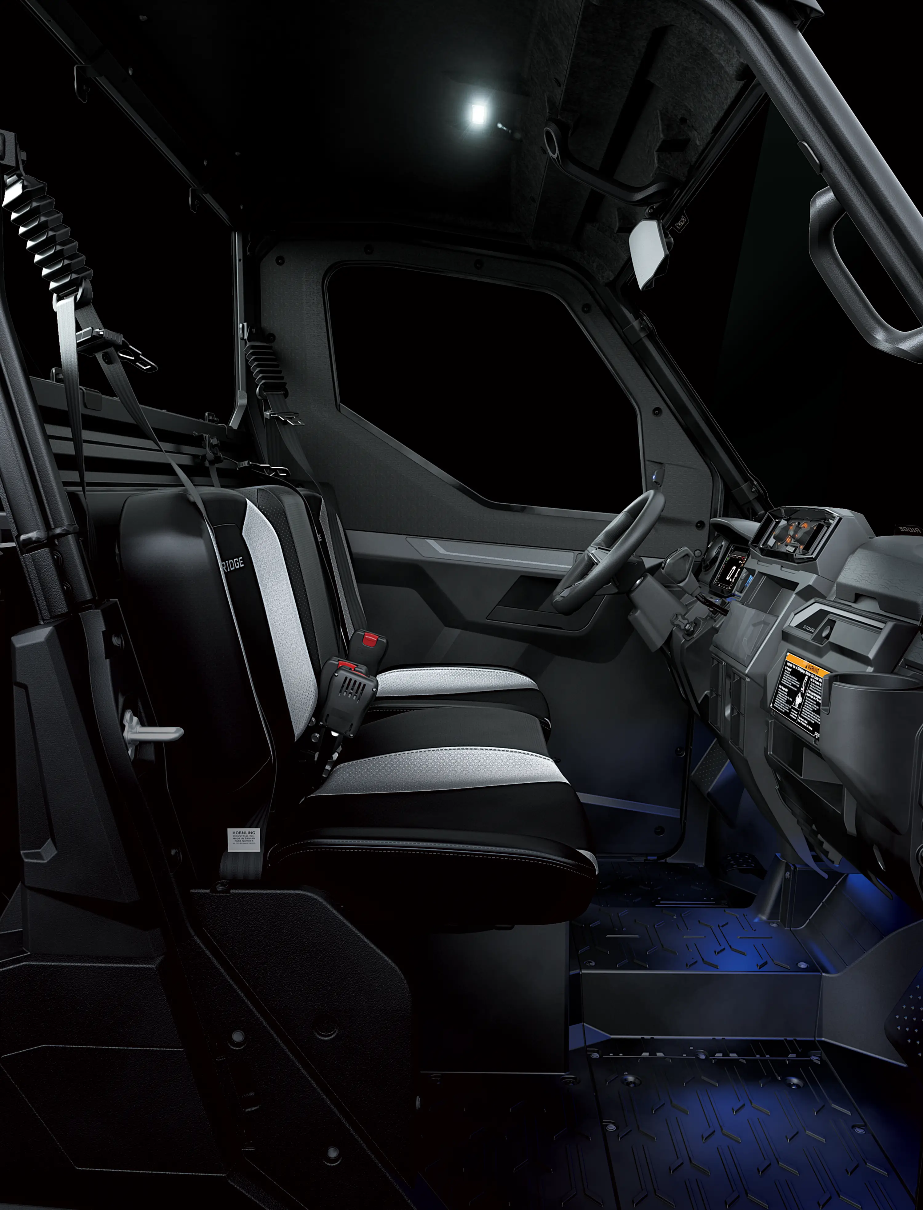 Side view of a side x side cabin.