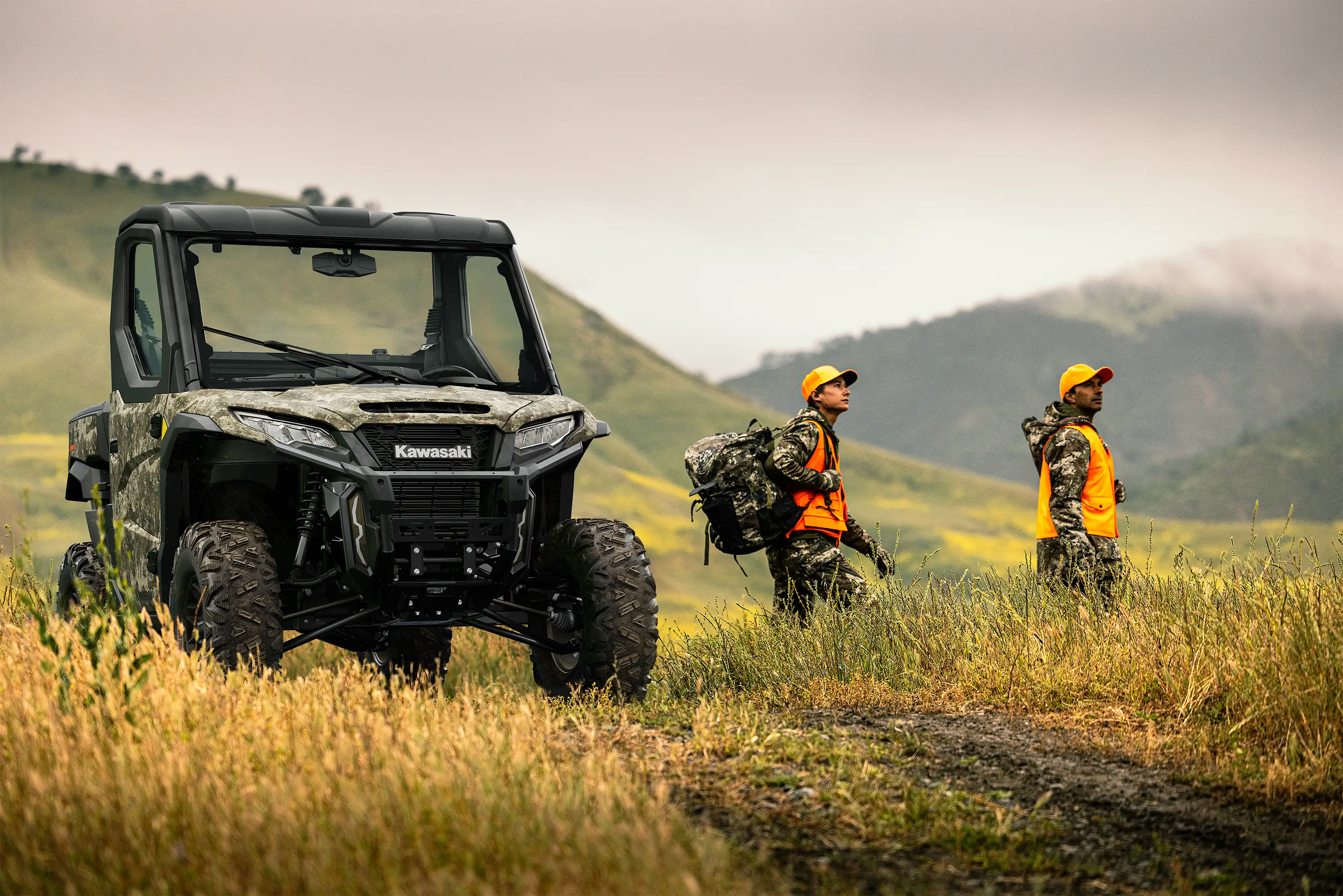 Front angle of a side x side parked off-road.
