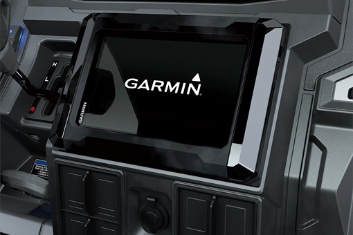 Close-up of the Garmin infotainment screen in a side x side. opens in a new window