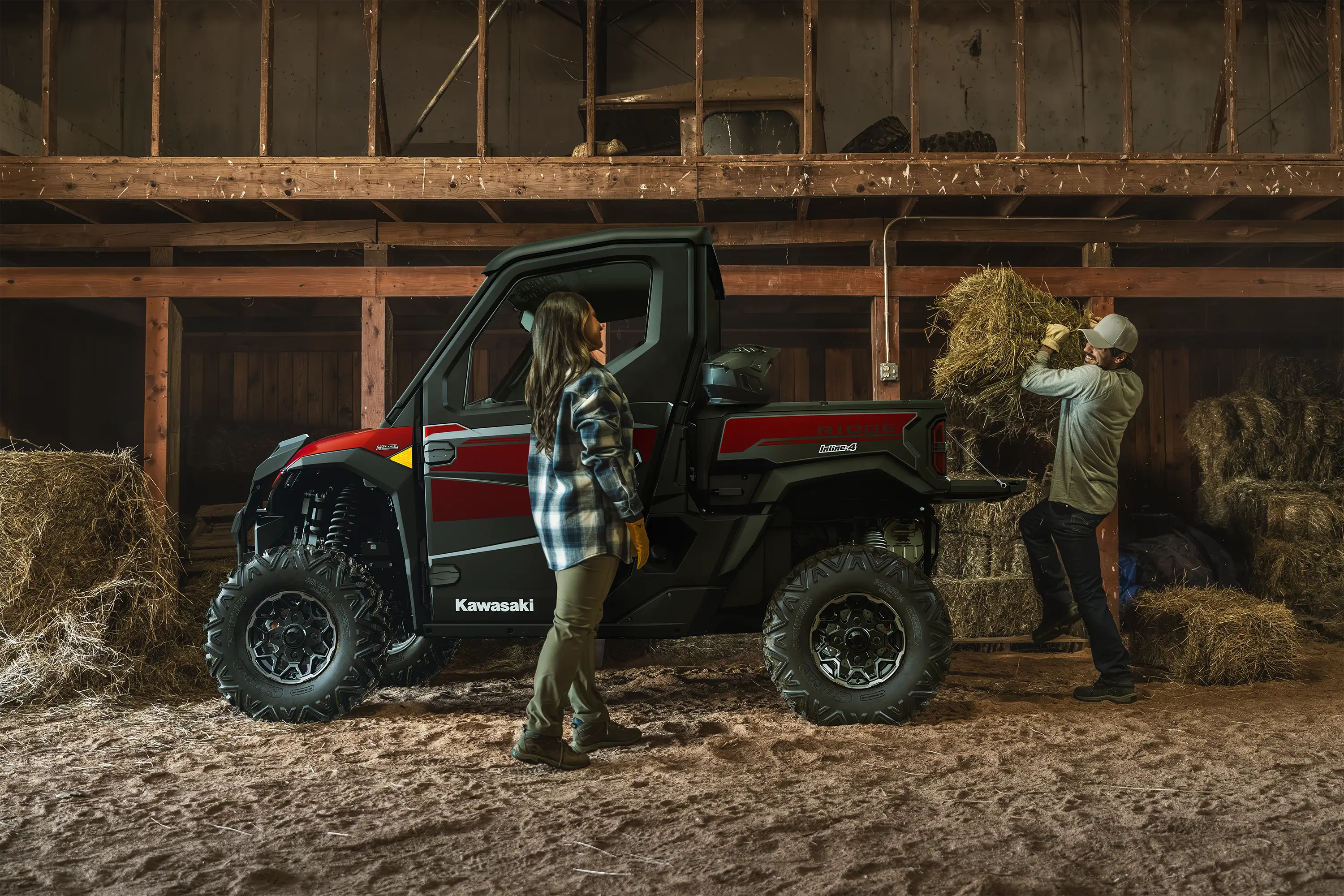 Side angle of a side x side parked in a barn.