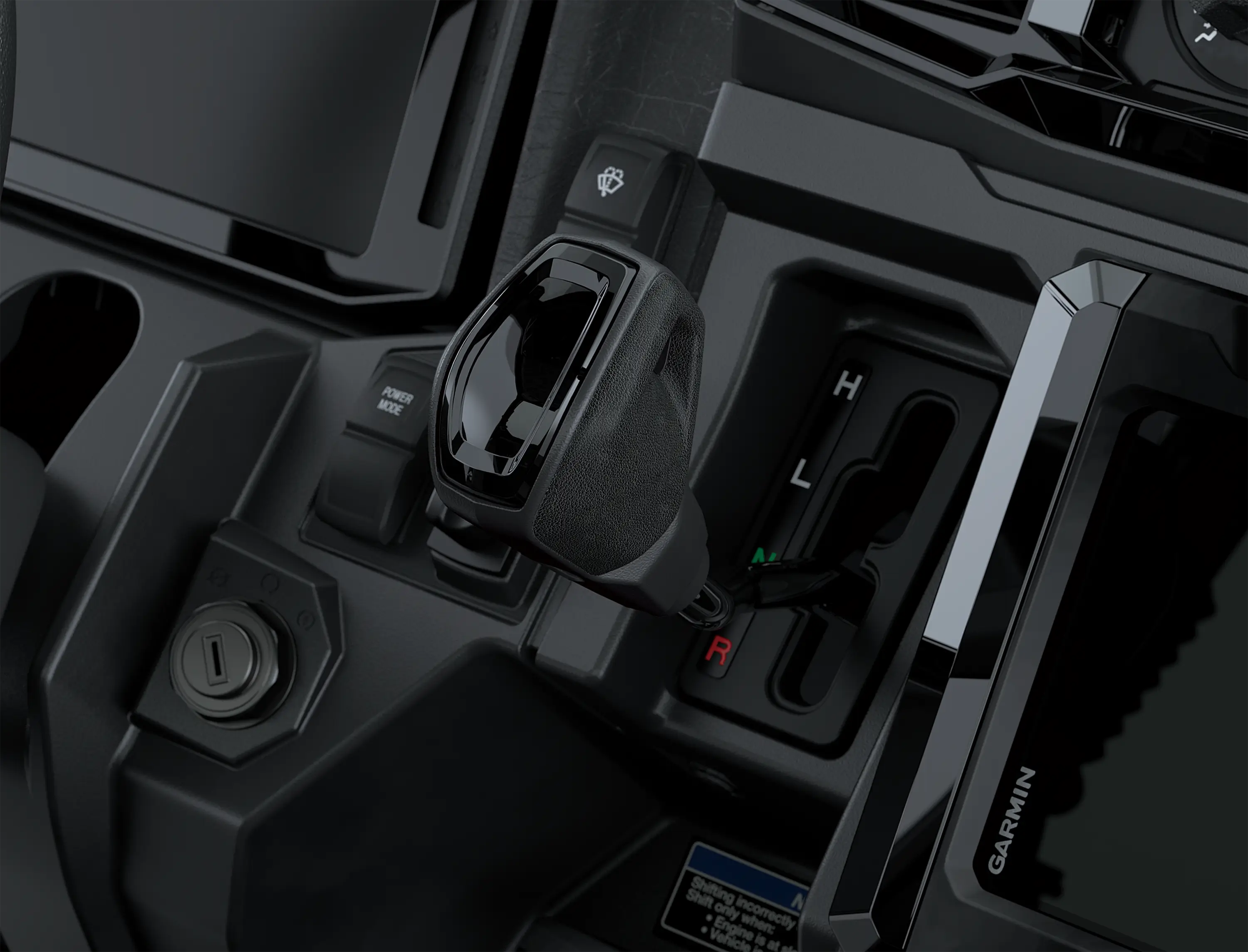 Close-up of the shifter in a side x side.
