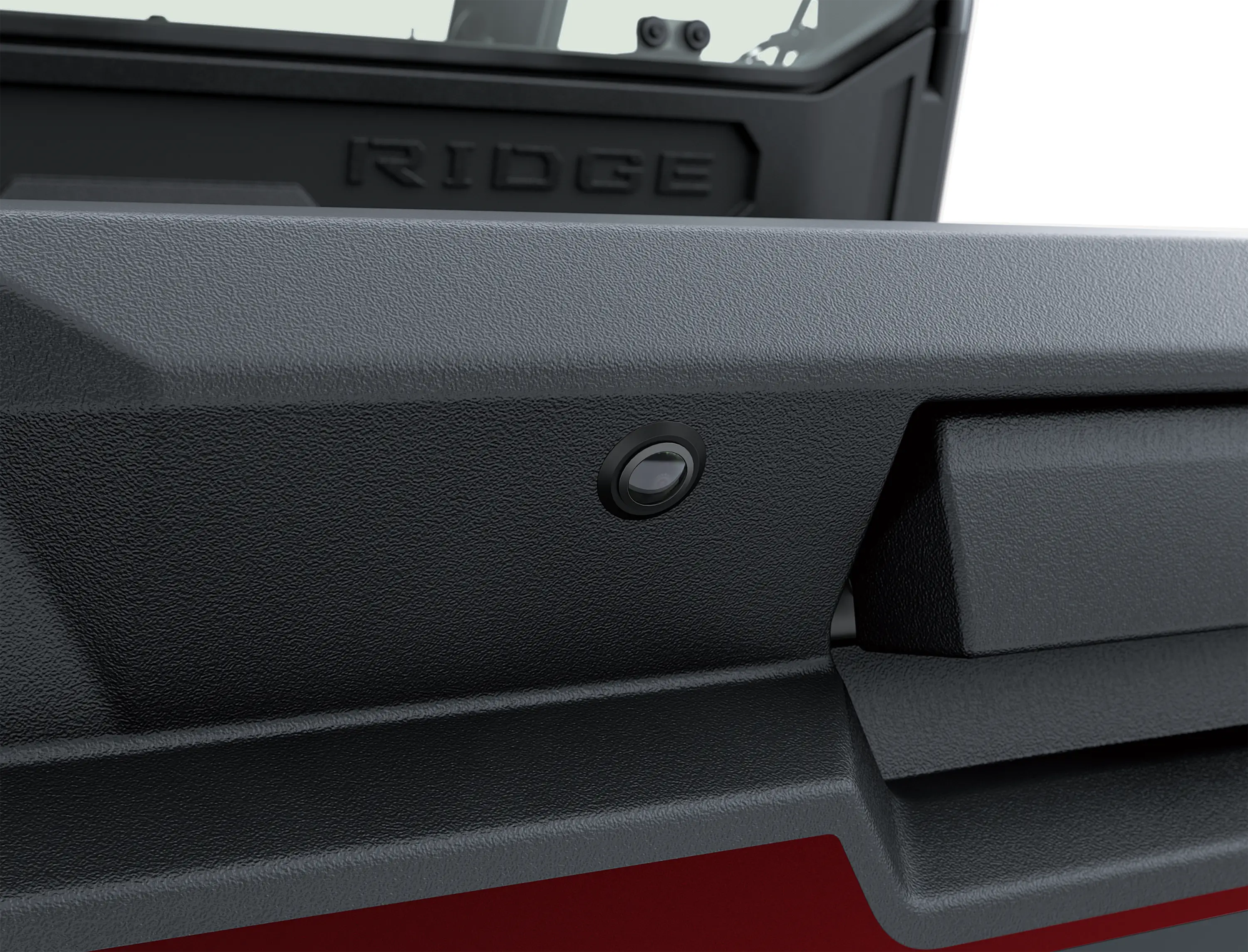 Close-up of the rear camera of a side x side.