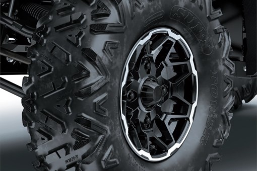 Close-up of a tire of a side x side in a white studio background. opens in a new window