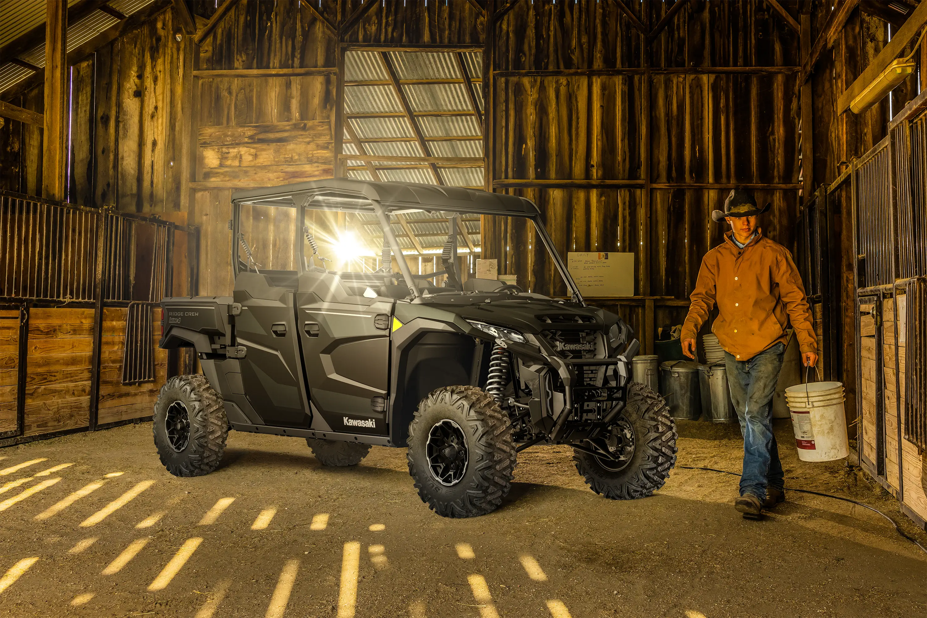 Side angle of a side x side parked in a barn.
