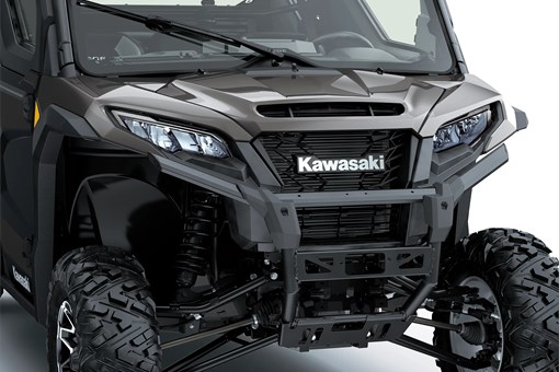 Close-up of the front end of a side x side in a white studio background. opens in a new window