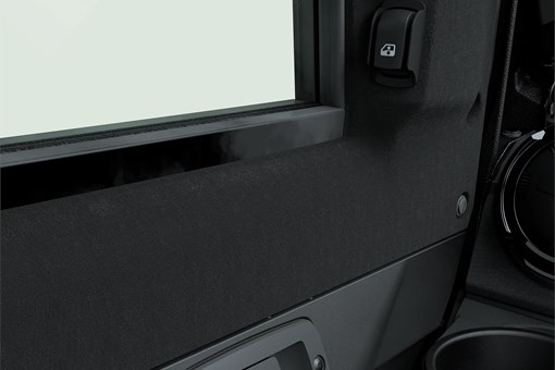 Close-up of the power window buttons in a side x side. opens in a new window