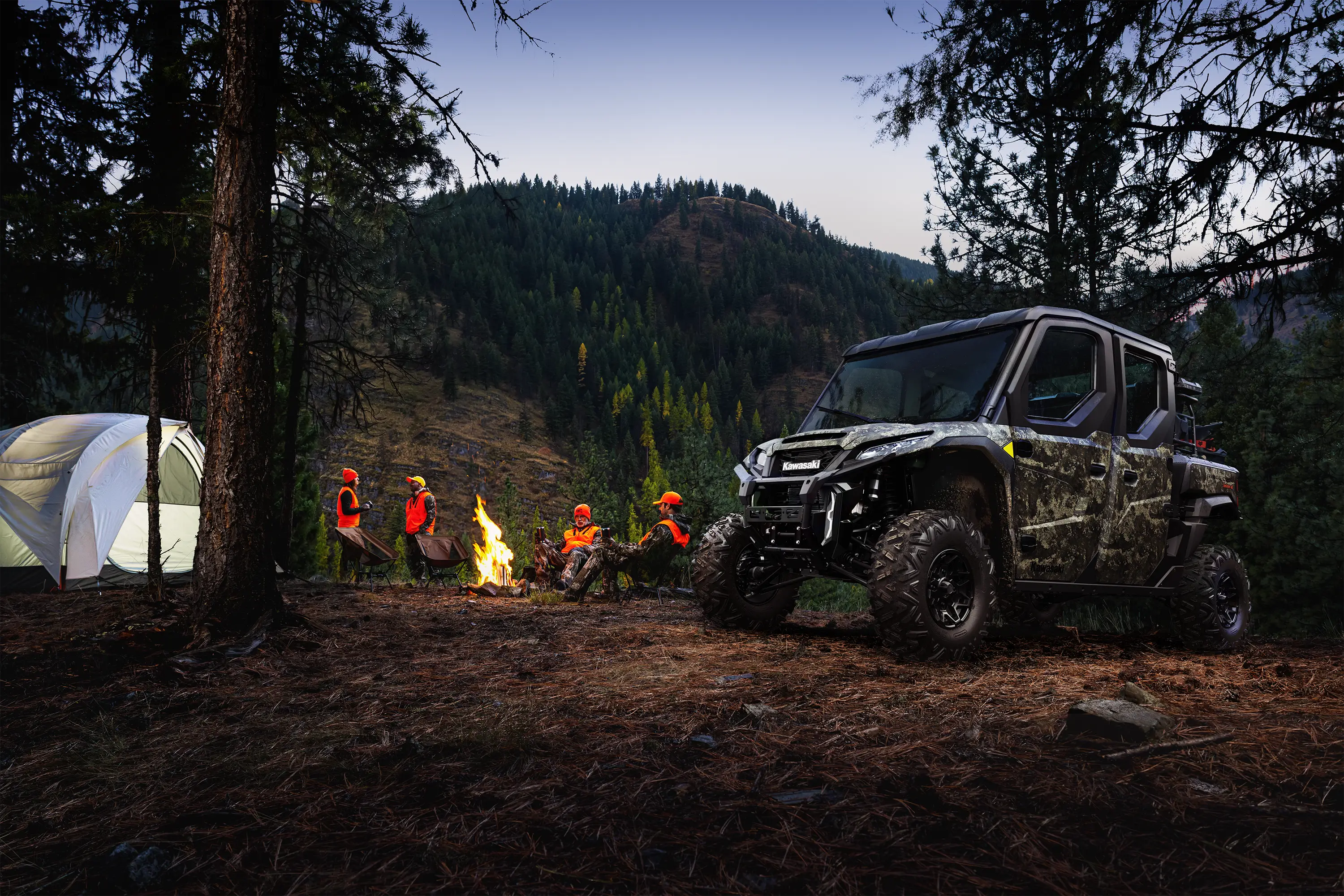 Side angle of a side x side parked in a camp.