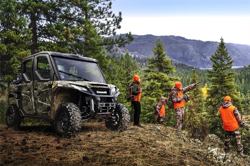 Three-quarter front angle of a side x side parked on an overlook. opens in a new window