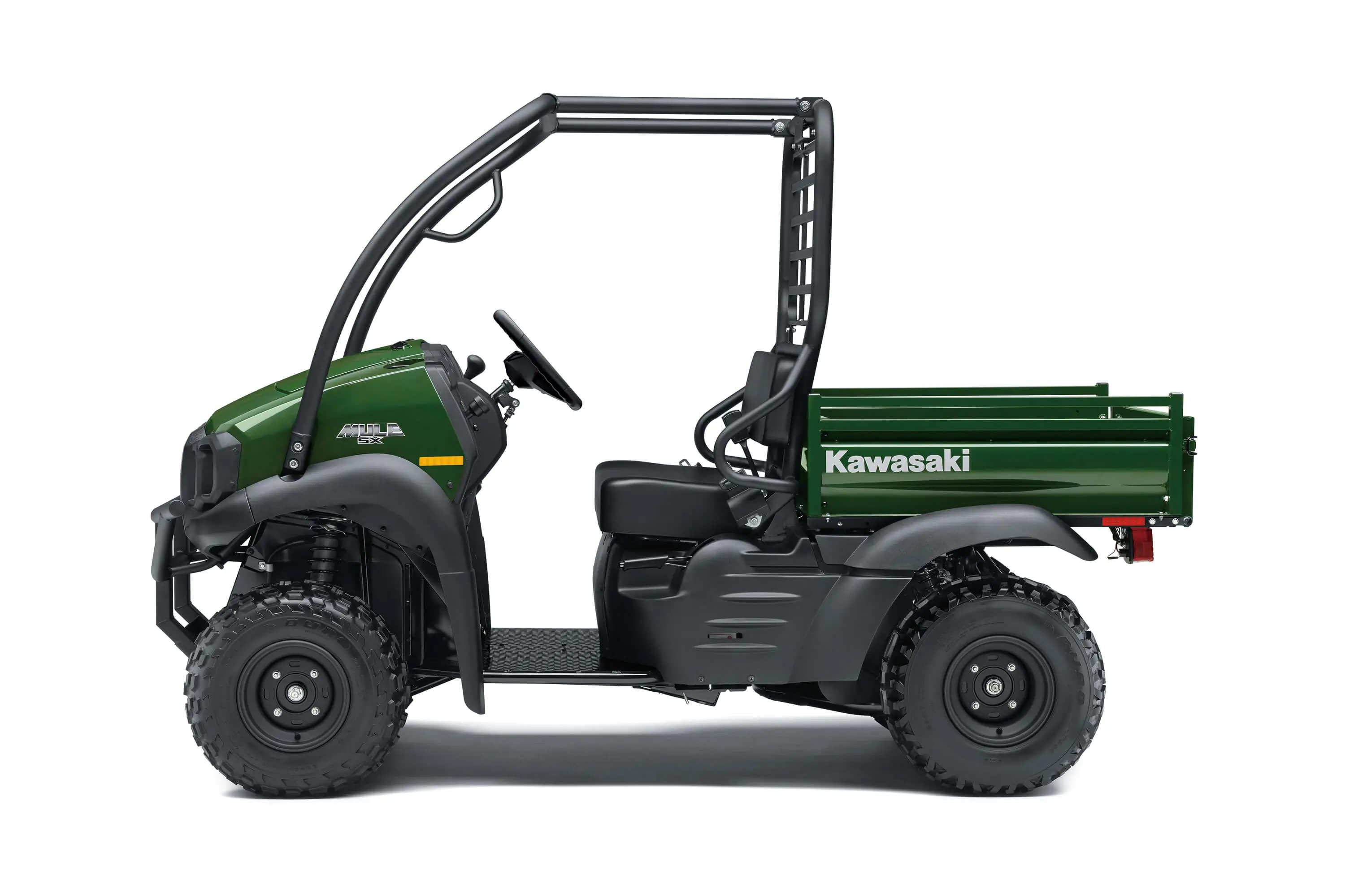 Left side view of a green side x side against a white studio background.