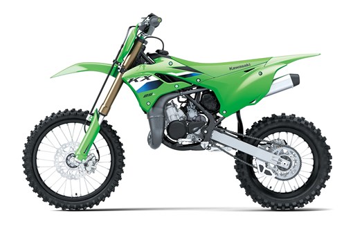Left side view of a green youth dirt bike in a white studio background. opens in a new window
