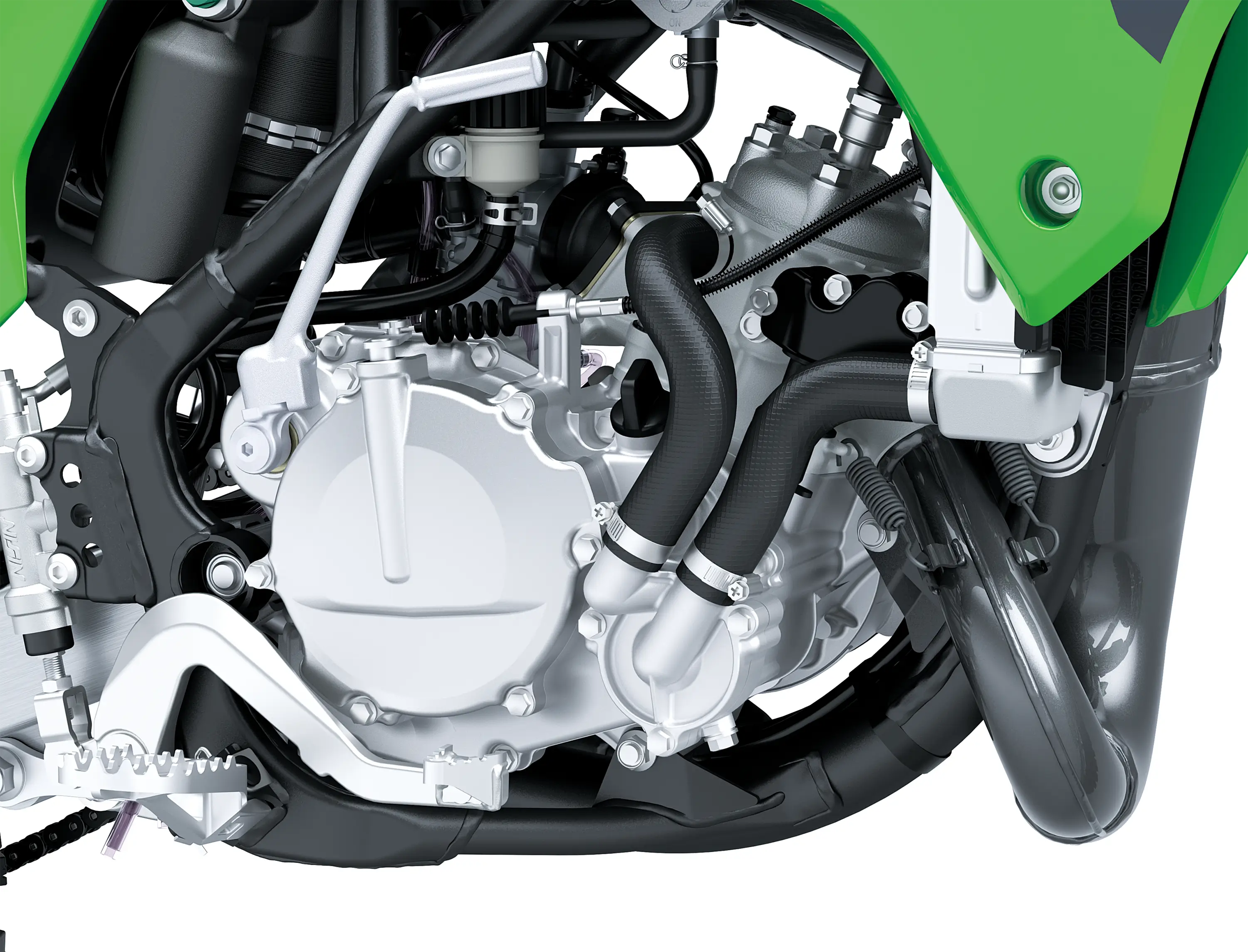 Close up right side view of a dirt bike engine in a white studio background.
