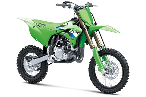 Front three-quarter right view of a green youth dirt bike in a white studio background. opens in a new window