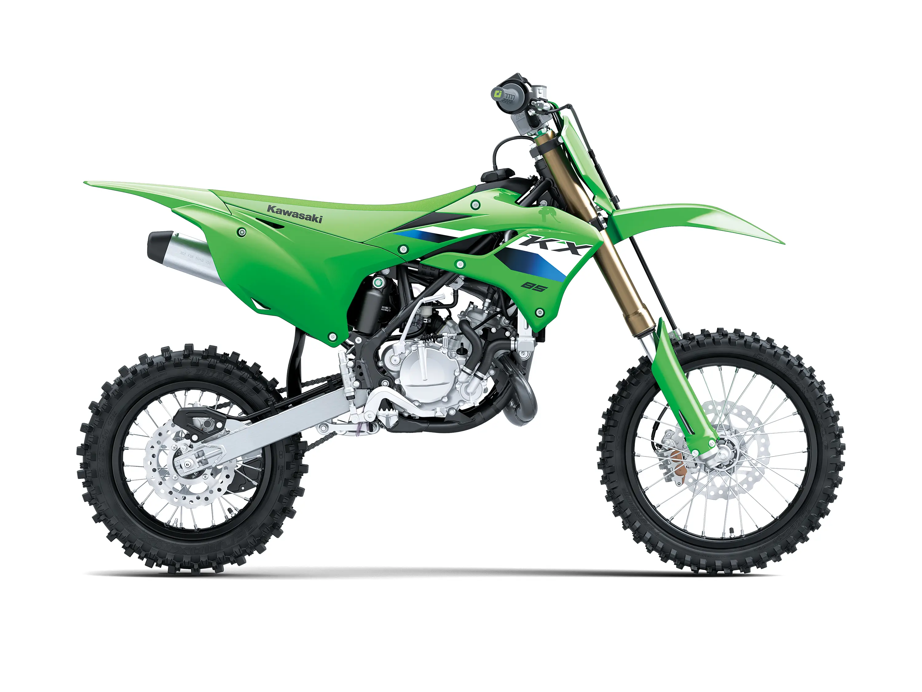 Right side view of a green youth dirt bike in a white studio background.