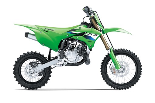 Right side view of a green youth dirt bike in a white studio background. opens in a new window