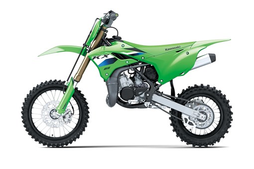 Left side view of a green youth dirt bike in a white studio background. opens in a new window