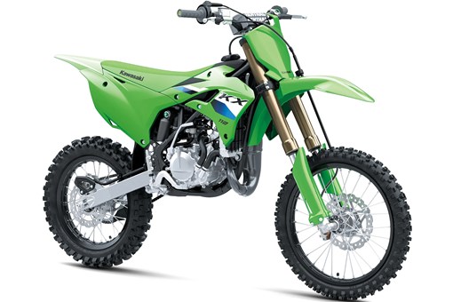 Front three-quarter view of a green youth dirt bike in a white studio background. opens in a new window