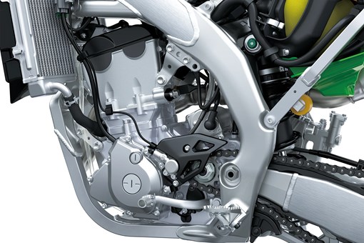Close-up of the left-side view of the engine bay of a motorcycle staged in a white studio background. opens in a new window