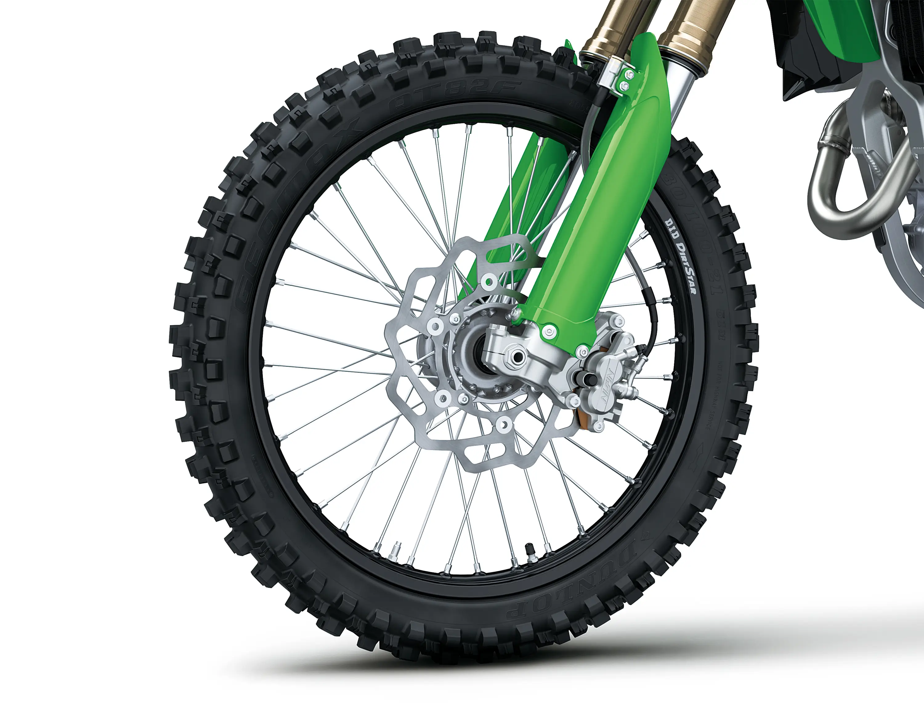 Close-up of the front wheel of a motorcycle staged in a white studio background.