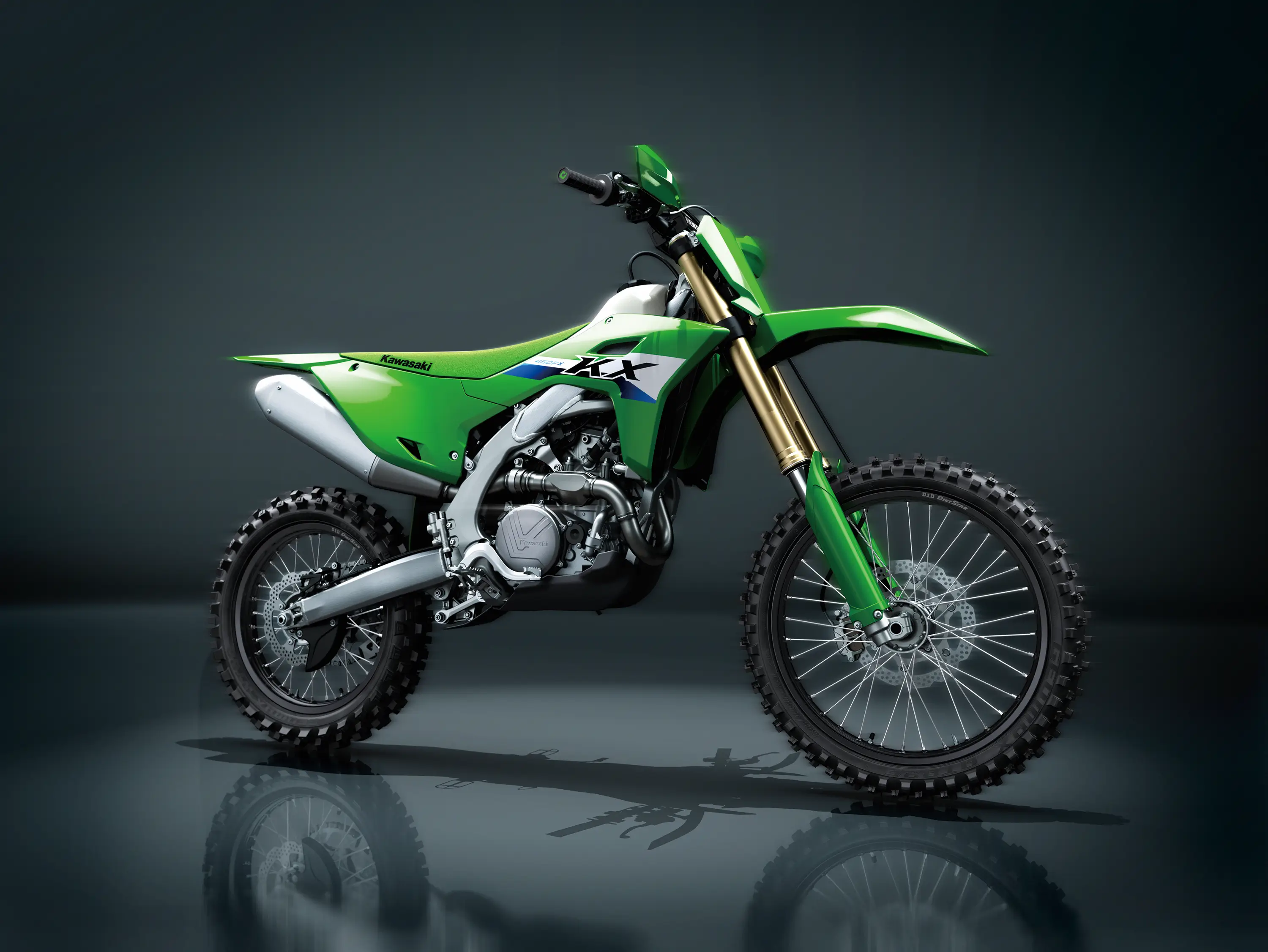 Side view of a motorcycle staged in a black studio background.