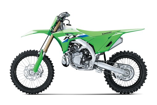 Left side angle of a green dirt bike in a white studio background. opens in a new window