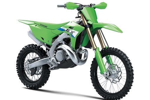 Front three-quarter angle view of a green 2-stroke dirt bike in a white studio background. opens in a new window