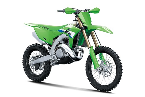 Front three-quarter angle view of a green 2-stroke dirt bike in a white studio background. opens in a new window