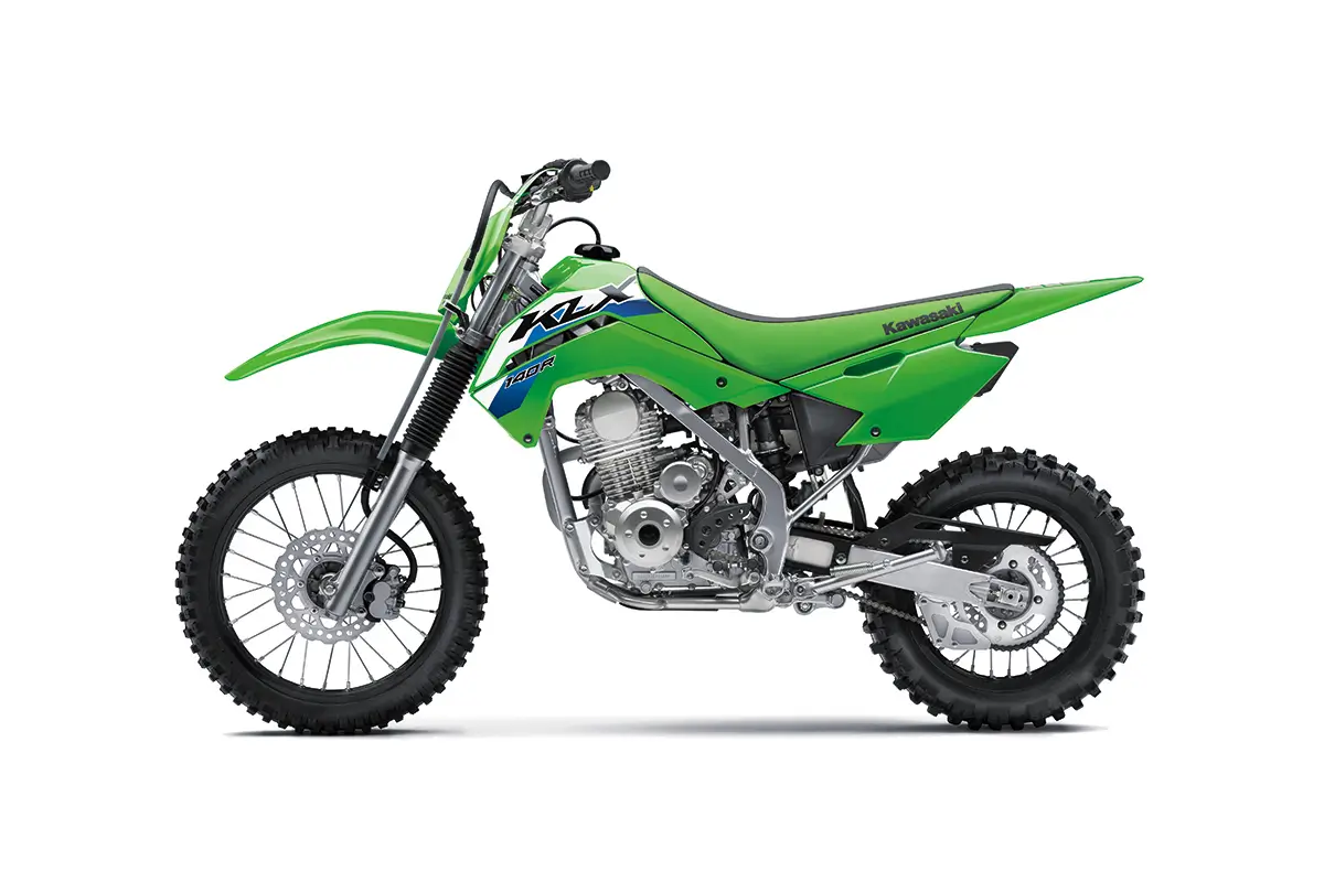 Left side view of a green youth dirt bike staged in a white studio background.