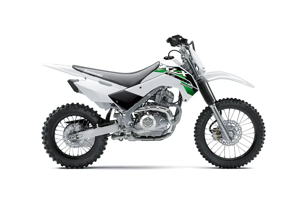 Right side view of a white youth dirt bike staged in a white studio background.