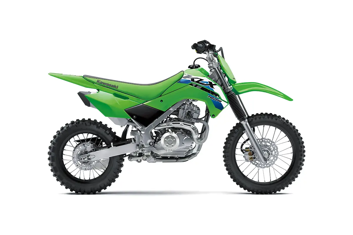 Right side view of a green youth dirt bike staged in a white studio background.