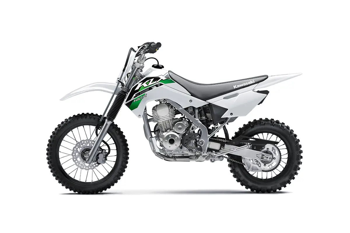 Left side view of a white youth dirt bike staged in a white studio background.