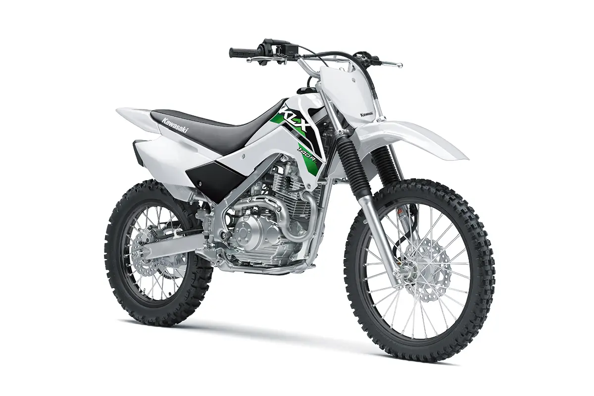 Front three-quarter view of a white youth dirt bike in a white studio background.
