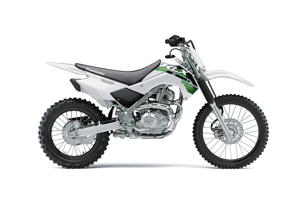 Right side view of a white youth dirt bike staged in a white studio background.