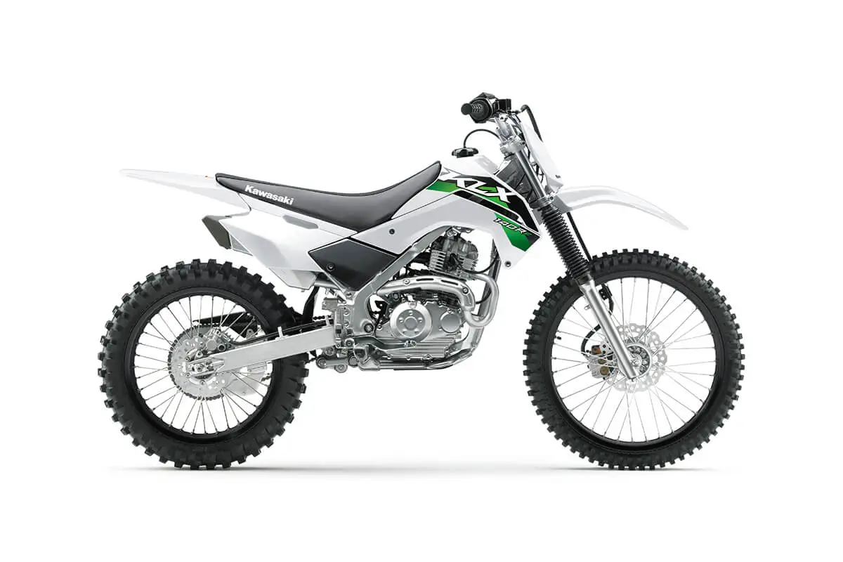 Right side view of a white dirt bike staged in a white studio background.