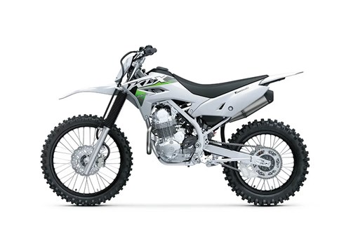 Profile angle of a silver motorcycle staged in a white studio background. opens in a new window