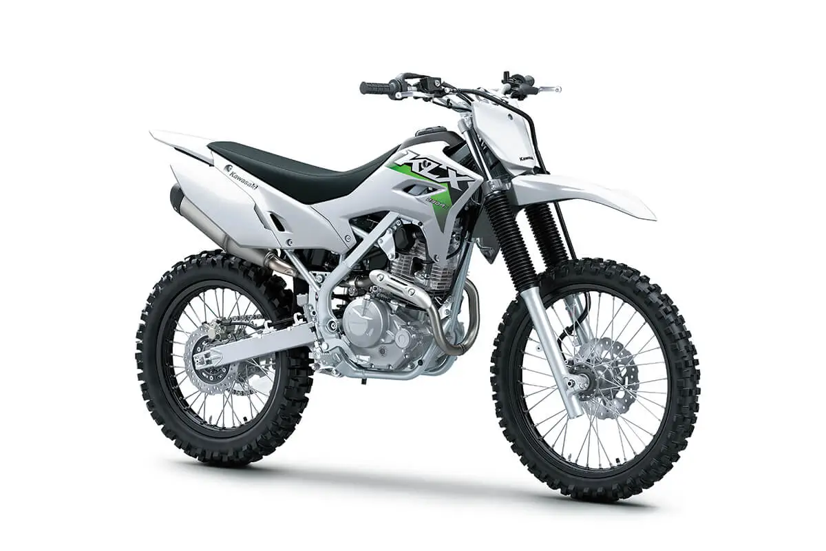 Three-quarter front angle of a silver motorcycle staged in a white studio background.