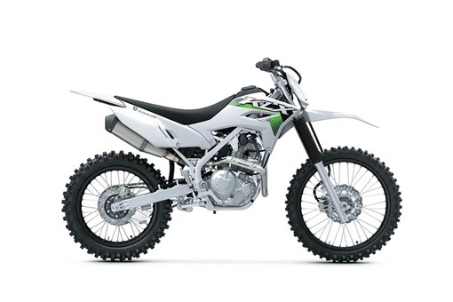 Profile angle of a silver motorcycle staged in a white studio background. opens in a new window