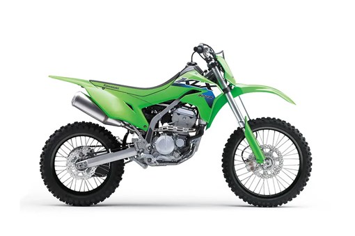 Right side view of a green dirt bike staged in a white studio background. opens in a new window