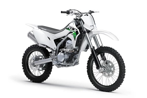 Front three-quarter view of a white dirt bike in a white studio background. opens in a new window