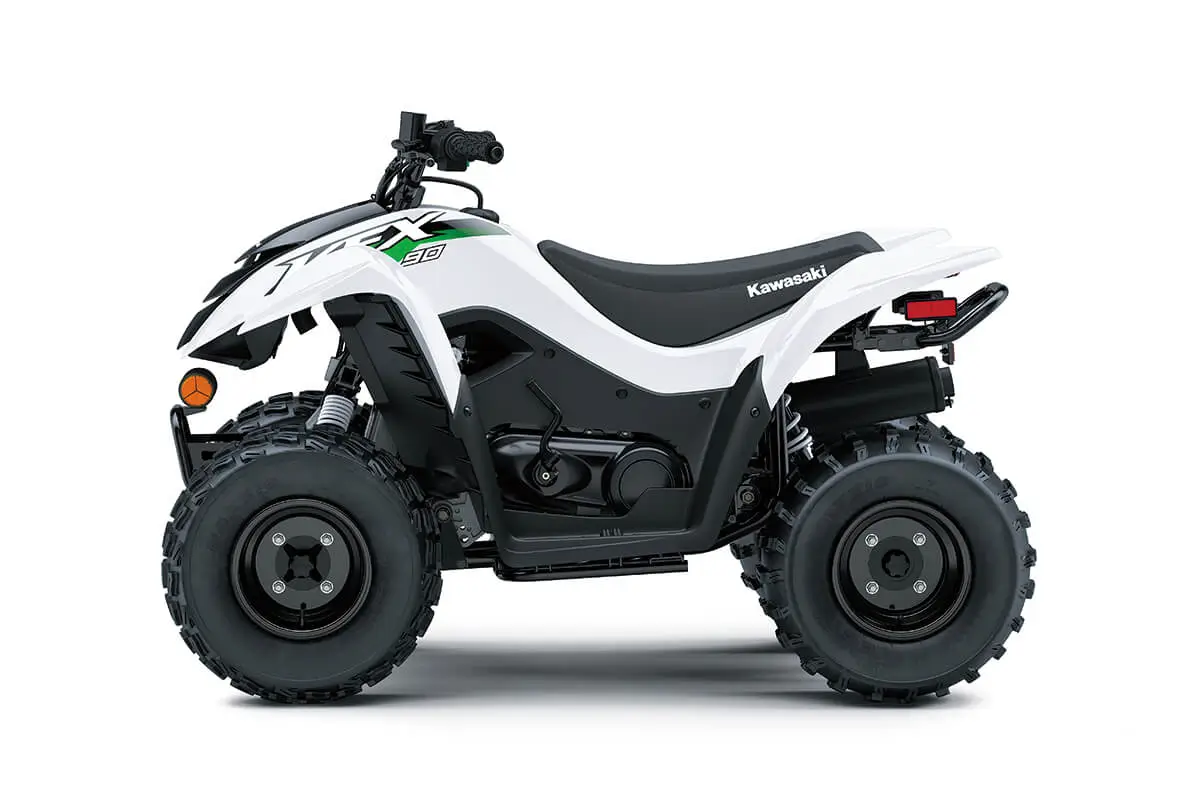 Left side view of a white youth ATV staged in a white studio background.