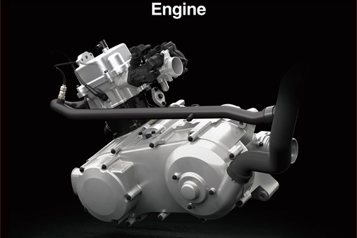 Left side view of the engine of a utility ATV against a black background. opens in a new window