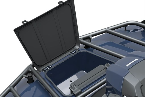 Detail view of the storage compartment on a utility ATV in a white studio background. opens in a new window