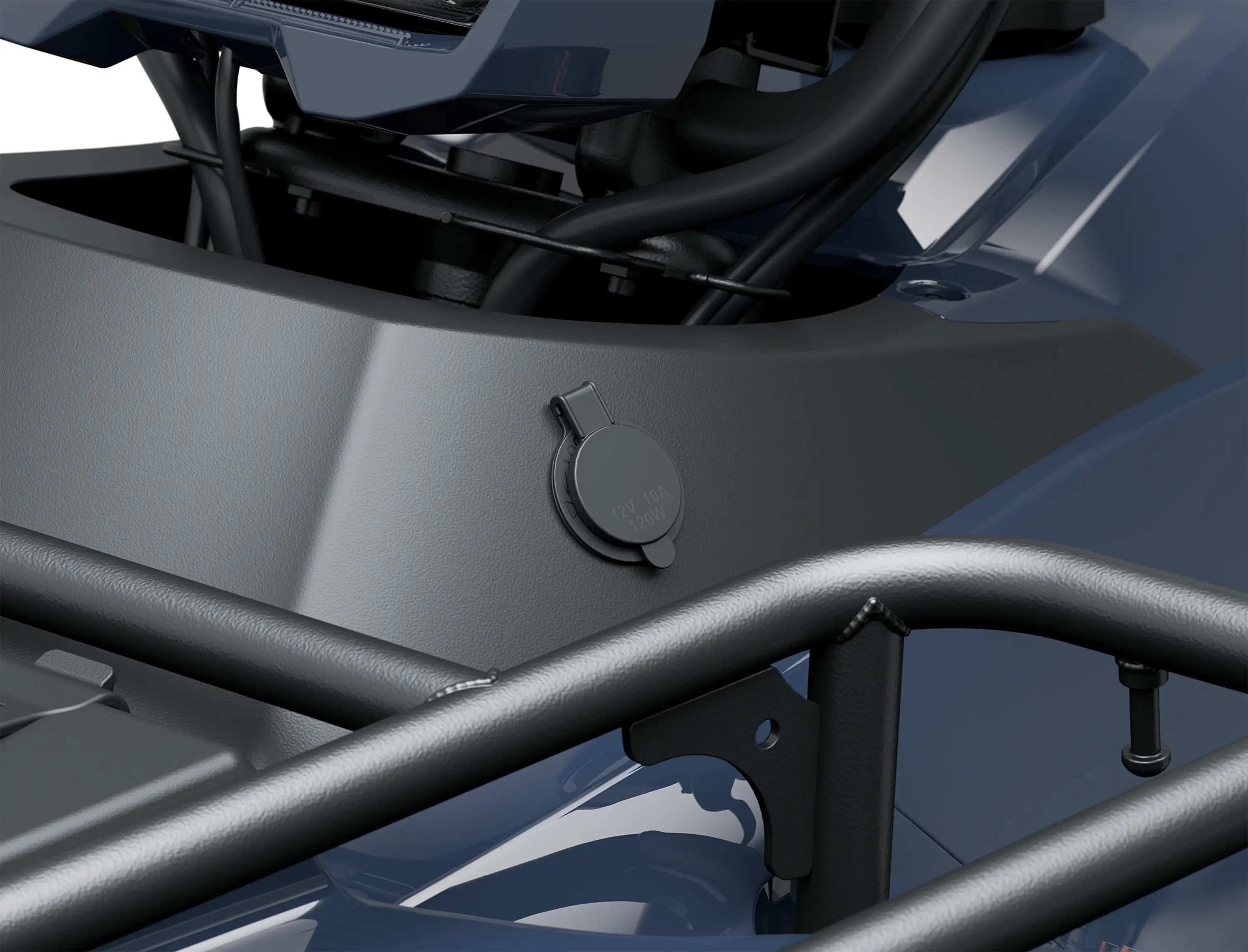 Detail view of a 12v outlet on a utility ATV in a white studio background.