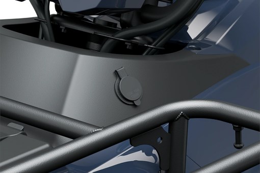 Detail view of a 12v outlet on a utility ATV in a white studio background. opens in a new window
