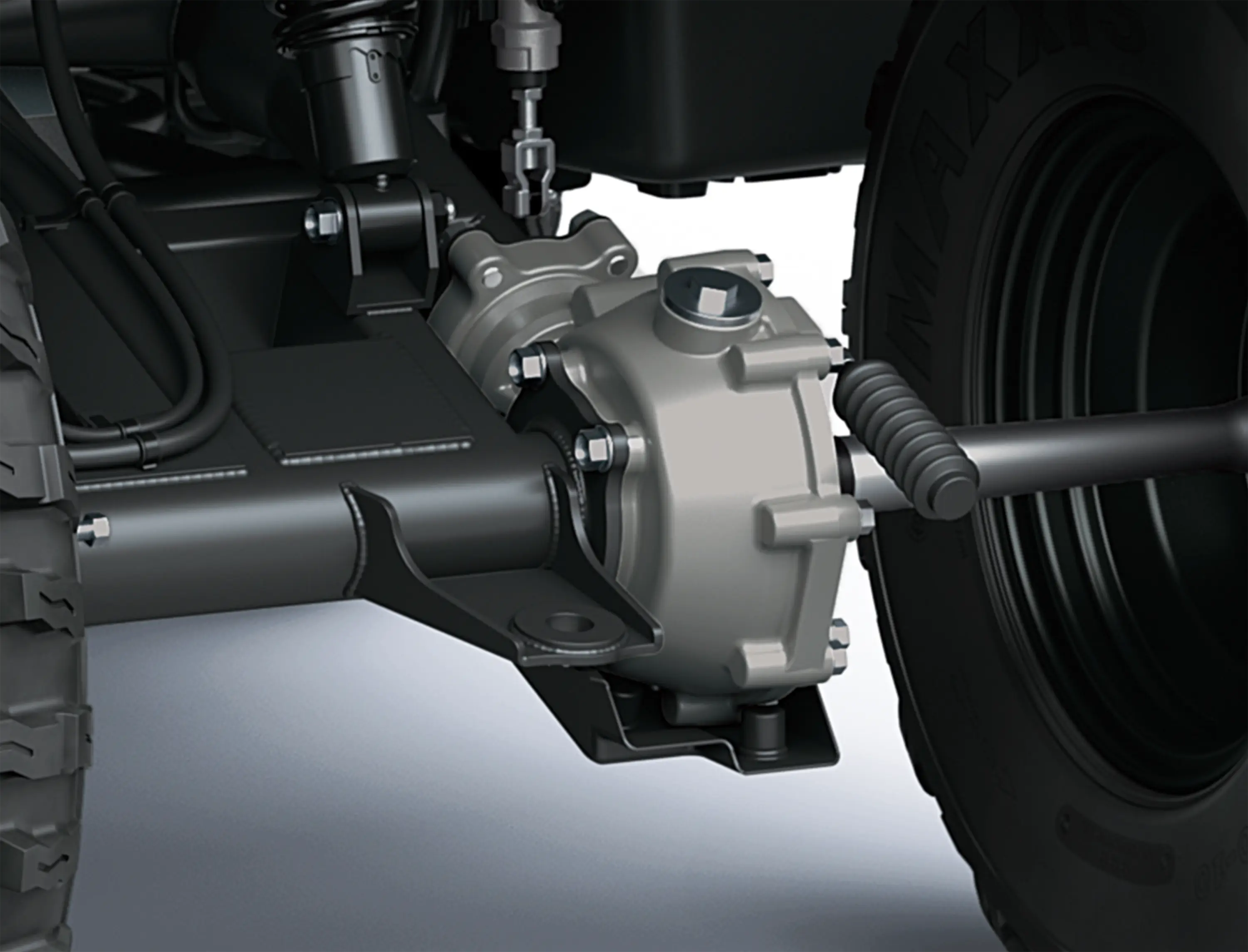 Detail view of the rear axle of a utility ATV in a white studio background.